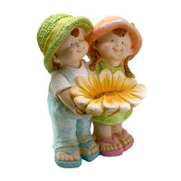 Decoratiune gradina ceramica fata si baiat cu floare 30x24,5x42 cm